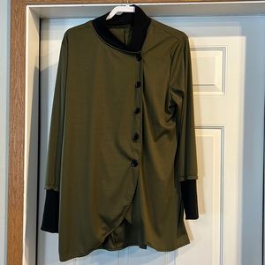 dark green long jacket with ribbed black cuffs.